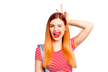 Nice fool red straight-haired young girl showing tongue out and horns with two fingers v-sign, like bunny ears, isolated