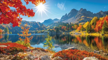 Fotobehang Tatra Vibrant high tatra lake at autumn sunrise with mountains and pine forest reflections