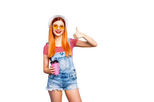 Girl in a white hat with pink cup of coffee or tea in her hands shows thumbs up isolated on shine vivid blue background - Powered by Adobe