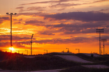 Sunset at the BMX track at Lee Valley VeloPark in East London, UK - obrazy, fototapety, plakaty
