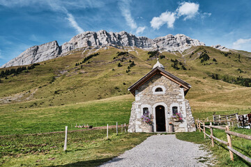 Fototapeta na wymiar small stone chapel in the french alps in the summer