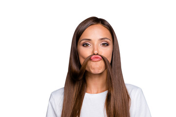 Portrait of brown-haired gorgeous nice young lady grimacing with curl, fake mustache over grey background, isolated