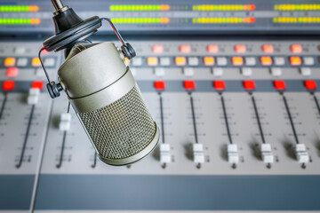 Professional microphone and sound mixer in radio station studio
