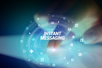 Finger touching tablet with social media icons concept