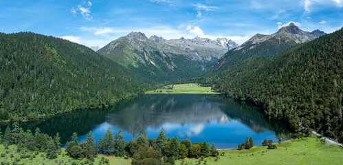 Aerial view of beautiful high altitude forest lake mountain landscape