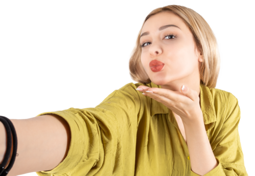 Send air kiss, pretty beautiful 20s blonde girl send air kiss. Taking selfie and blowing. Young girl have video call with boyfriend. Isolated transparent png. 