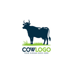Green-themed cow logo with field background