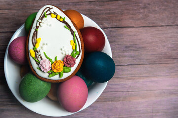 Easter gingerbread cookie on  wooden table. Egg shaped cookies for Easter