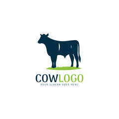 Elegant cow logo with a grass base in blue
