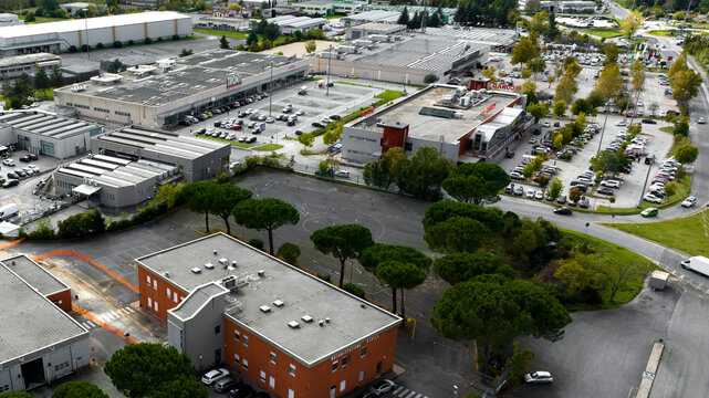 Aerial view of the Trony megastore, specializing in the sale of electronic items. Next to the Conad supermarket. Rieti, Italy - March, 2024