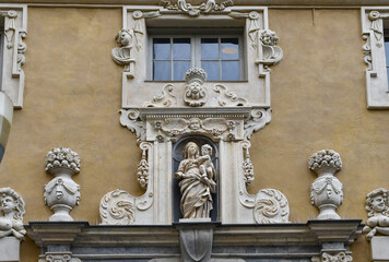Detail of the facade of Palazzo Borea d'Olmo (17-18th centuries), in Baroque style, with a votive shrine of Madonna and Child, Sanremo, Imperia, Liguria, Italy
