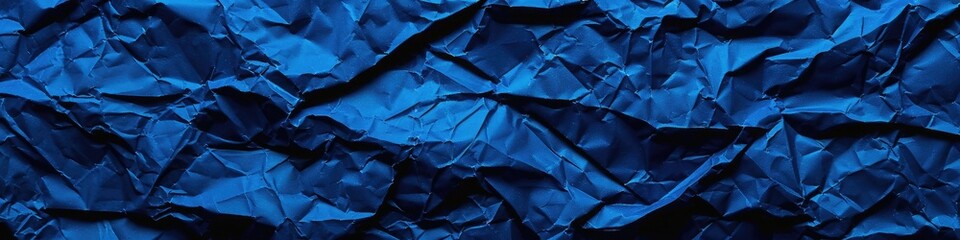 Captivating possibilities with a crumpled paper texture background in royal blue, invoking a sense of regality and grandeur.