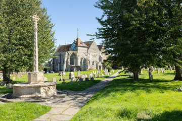 Fototapeta na wymiar War memorial and St Thomas the Martyr Church at Winchelsea, East Sussex, UK