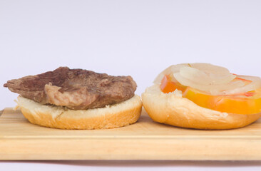 Delicious Beef Sandwich with Fresh Tomatoes and Onions