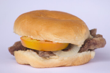 Delicious Beef Sandwich with Fresh Tomatoes and Onions