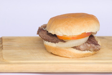 Delicious Beef Sandwich with Fresh Tomatoes and Onions
