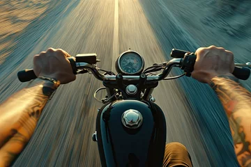 Tuinposter Close-up. Hands of a man driving a motorcycle on a highway background. © BetterPhoto