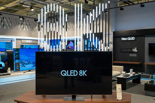 8K TV in modern electronics store. Samsung QLED 8K TV in a shop window. Minsk, Belarus - March 17, 2024
