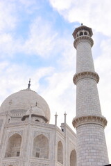 Fototapeta na wymiar AGRA, INDIA - MARCH 17: The people visit Taj Mahal, Agra, India on March 17, 2024. The Taj Mahal is a mausoleum located in Agra, India and is one of the most recognizable structures in the world