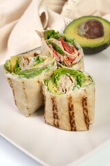 Delicious tortilla wraps with chicken and vegetables