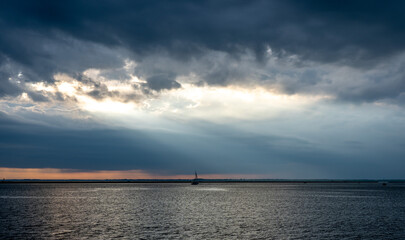 Sailboat on Lake Erie under Stormy Skies