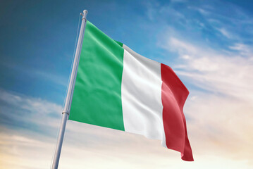 Waving flag of Italy in blue sky. Italy flag for independence day. The symbol of the state on wavy fabric.