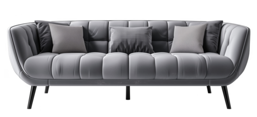 A gray couch with pillows on it. The couch is long and has a curved shape. The pillows are arranged in a way that makes the couch look inviting and comfortable