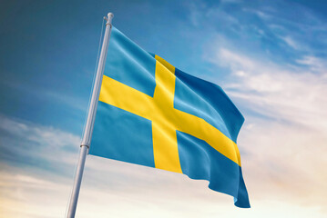 Waving flag of Sweden in blue sky. Sweden flag for independence day. The symbol of the state on wavy fabric.