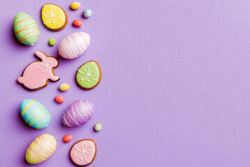 Happy Easter concept. Preparation for holiday. Easter eggs on colored background. flat lay top view copy space banner