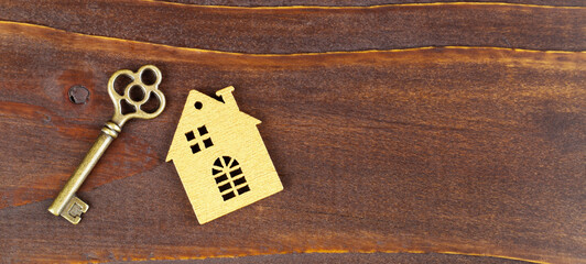 House and gold key. Real estate, home ownership banner. - 761466191