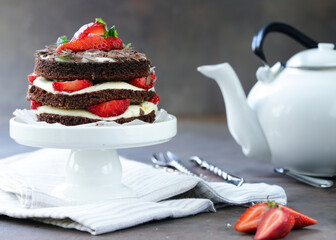 chocolate cake dessert with fresh strawberries