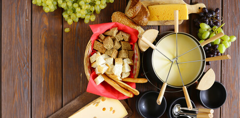 cheese fondue with grapes and fresh bread