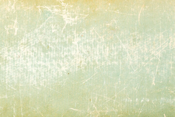 Texture of old vintage green book cover. Textured scratched cardboard