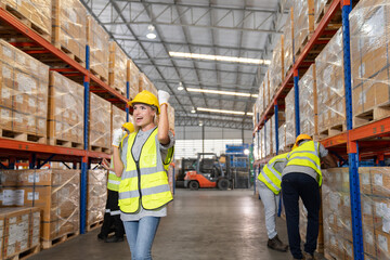 
Professional warehouse worker team celebrating success in warehouse factory, Cheerful workers having fun at work, Happiness at job, Concept of success, Happy team enjoying their successful job - 761471938