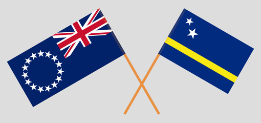 Crossed flags of Cook Islands and Country of Curacao. Official colors. Correct proportion
