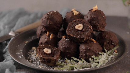 Dark chocolate truffles with hazelnuts