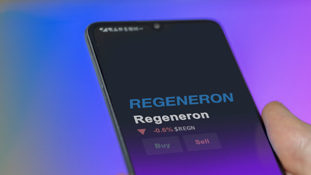 March 12th 2024 Tarrytown, New York. The logo of Regeneron on the screen of an exchange. Regeneron price stocks, $REGN on a device.