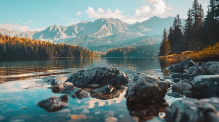 A peaceful body of water surrounded by trees and rocks. Perfect for nature and travel concepts - obrazy, fototapety, plakaty