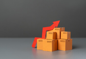 Boxes with goods and up arrow. Rising prices. Increase in supplies and production rates....