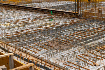 construction site with a lot of metal bars and wires