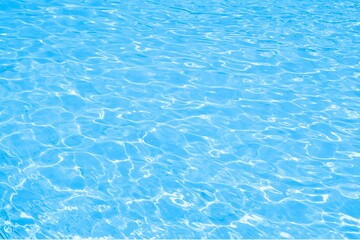 Clear blue water surface with beautiful ripples and bubbles. Water shadow surface texture natural...