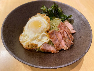 Green chili fried rice with sliced beef and fried egg