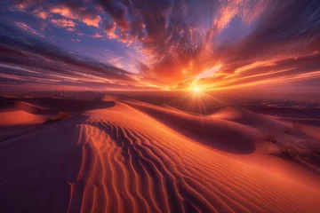 Papier Peint photo Bordeaux A mesmerizing sunset over the desert with sand dunes casting long shadows