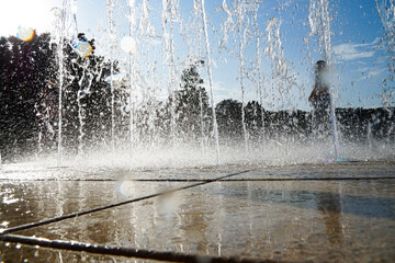 A working fountain on a clear day in the capital.   