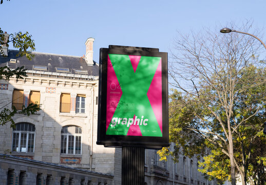 Mockup of customizable vertical sign by building