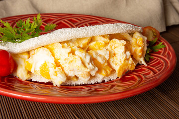 Tapioca Pancake with eggs Brazilian manioc food in front view