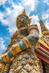 Obraz premium A statue of a man dressed in a blue and gold outfit. Suitable for historical or cultural concepts