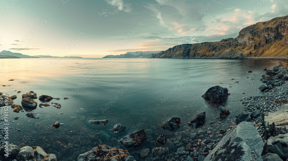 Poster scenic view of a body of water with rocks and a majestic mountain in the background. ideal for trave