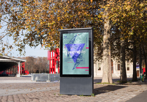 Mockup of customized vertical billboard by trees
