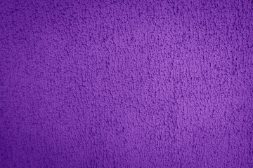 Texture purple plastered wall for background